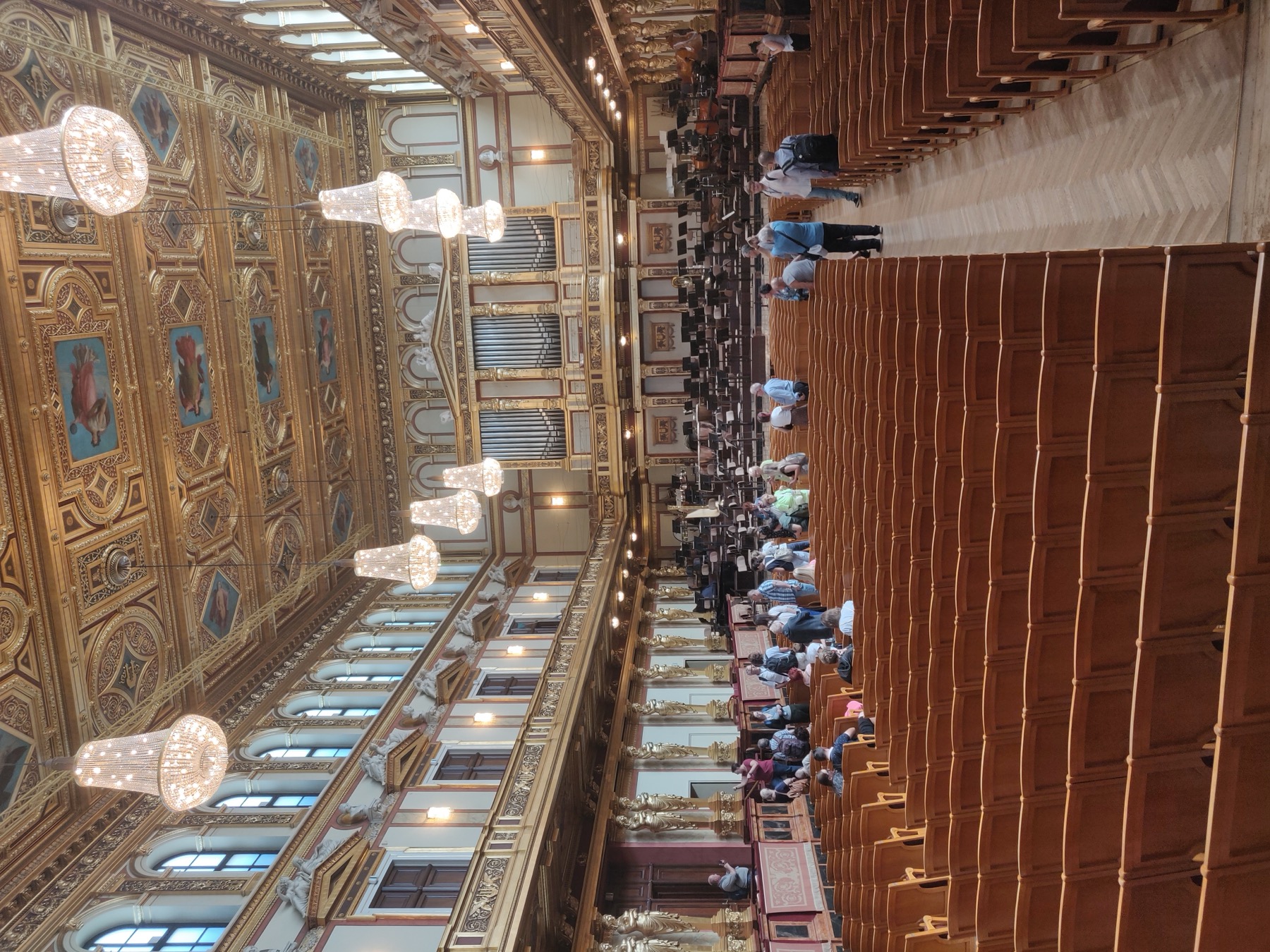 The Great Hall of the Musikverein, Vienna — golden caryatids, chandeliers, and the stage of the Vienna New Year’s Concert